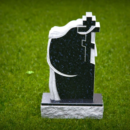 Mirrored faith elements wrapped in soft carving create heartfelt memorials