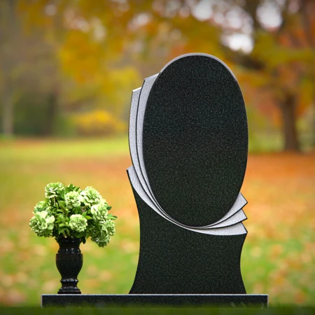 Elegant oval granite headstones with layered accents for lasting tributes.