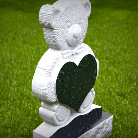 Blessed headstone near me engraved with child’s heart and teddy