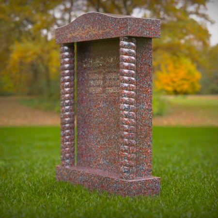Custom tombstones with cross-carved panels — elegant tribute with spiritual grace