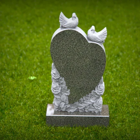 Doves rise around heart shape etched with floral memory in grave markers