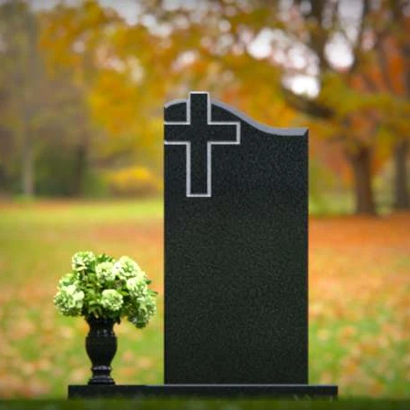 Granite headstones with cross engraving symbolizing faith and remembrance.