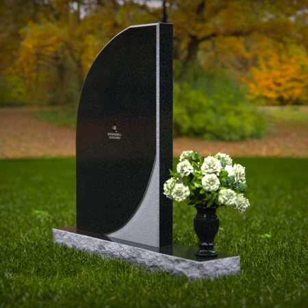 Modern curved memorial headstones with dual-tone finish for elegant tribute.