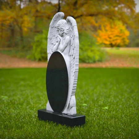 1861 - Angel Memorial Headstone with Carved Praying Figure and Oval Inscription Panel
