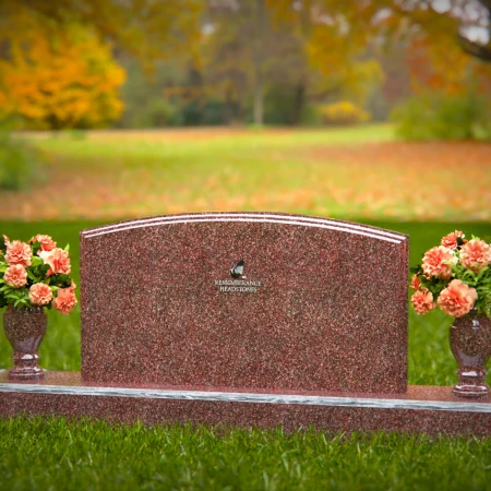 Dual vase headstones with arched design honoring shared memories.