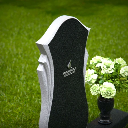 Elegant curved granite headstones crafted as a timeless memorial tribute.