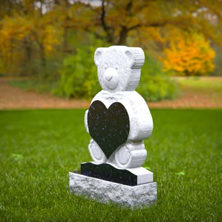 Blessed headstone near me engraved with child’s heart and teddy