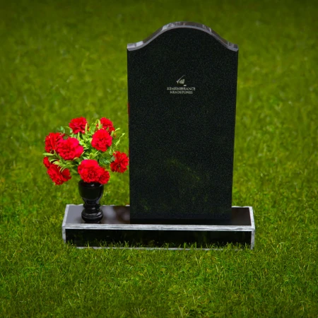 Classic upright headstones with flower vase for timeless memorials.