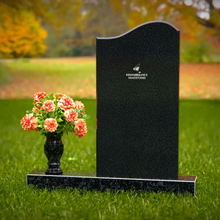Curved granite headstones with elegant flower vase tribute.