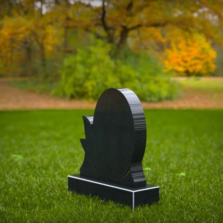 oval silhouette headstone etched with graceful leaves for headstone prices