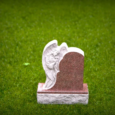 Graceful presence keeps memory alive through memorials, headstone, and grave ornaments.