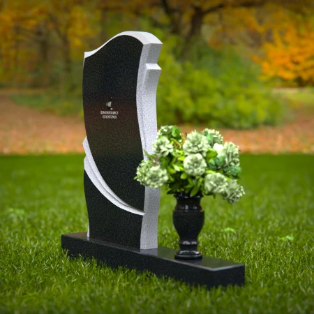 Elegant granite headstones with curved design and flower vase.
