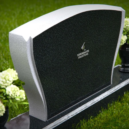 Elegant double vase headstones with contoured design for tribute.