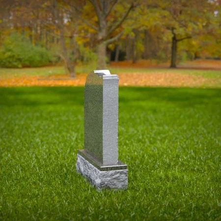 carved granite memorial inspired by natural growth and grace for headstones