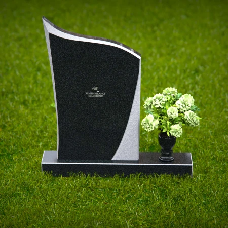 Modern headstones featuring flowing curved design and floral vases.
