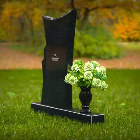 Contemporary headstones featuring a flowing design and floral vase.