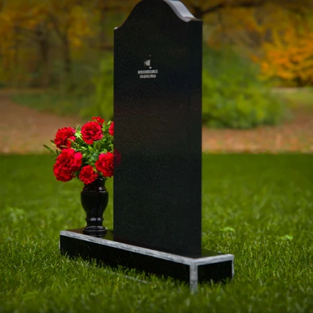 Classic upright headstones with flower vase for timeless memorials.