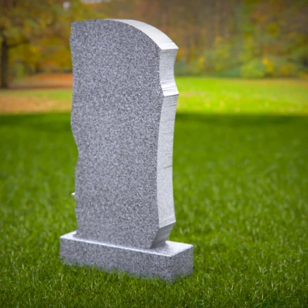 Carved forms reflect dignity and meaning in sculpted tombstones