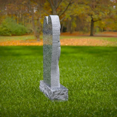 Artisan-crafted angel expresses warmth and memory in headstone near me