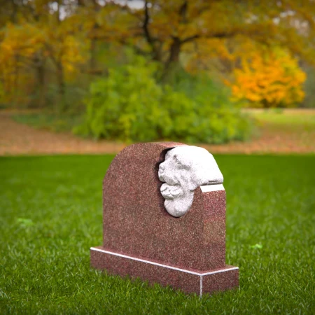 deeply personal headstone with sculpted dog detail for headstones