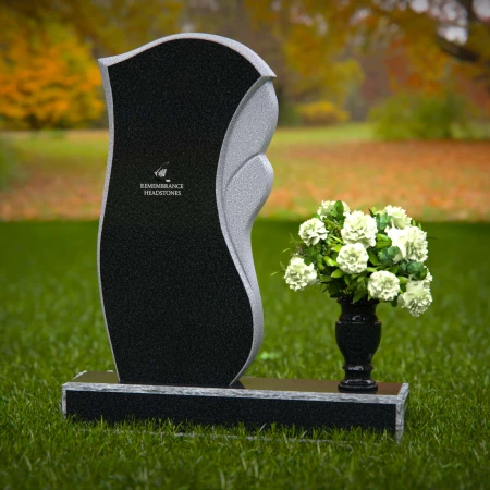 Modern wave design headstones with elegant detailing for tribute.