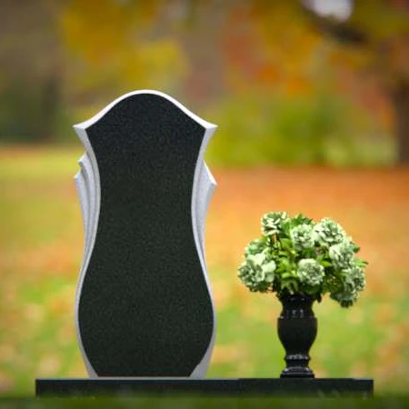 Elegant curved granite headstones crafted as a timeless memorial tribute.