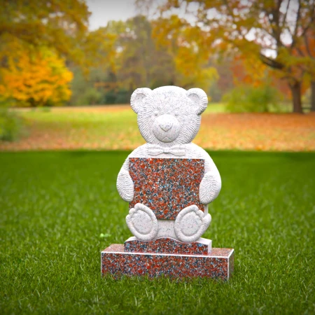 Sympathetic grave markers for kids featuring plaque-holding teddy