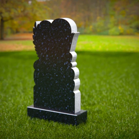 Soaring grace and loving shape unite in dove-heart tombstones