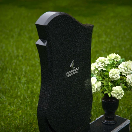 Elegant wave design headstones crafted for lasting remembrance.