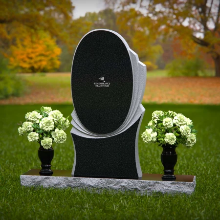 Modern oval granite headstones with layered base for elegant tribute.