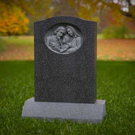 1917 - Upright Monument with Family Relief Carving in Peaceful Setting