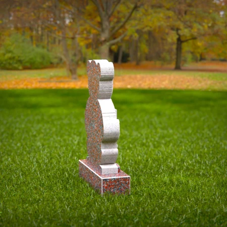 Sympathetic grave markers for kids featuring plaque-holding teddy