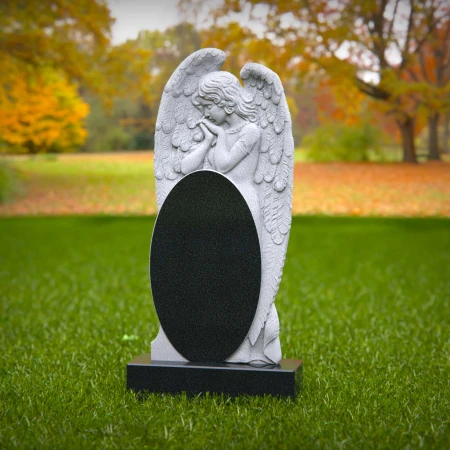 1861 - Angel Memorial Headstone with Carved Praying Figure and Oval Inscription Panel