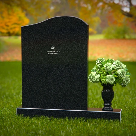 Timeless upright headstones with rounded top for elegant tribute.
