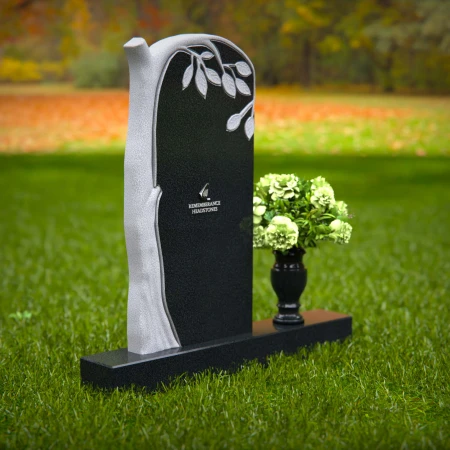 Elegant headstones featuring a tree design symbolizing growth and life.