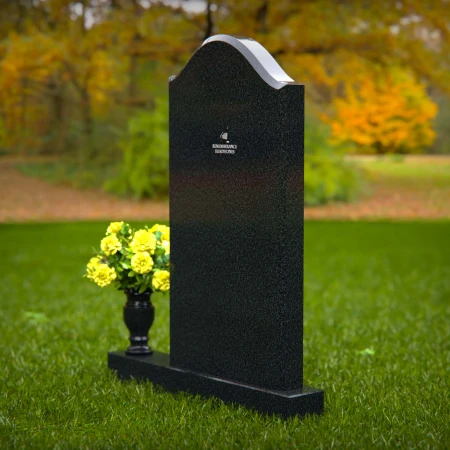 Elegant single granite headstones with curved top and flower vase.