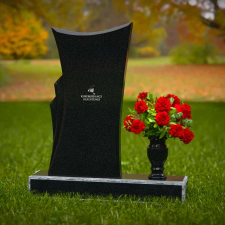 Contemporary granite headstones with unique shape and flower vase.