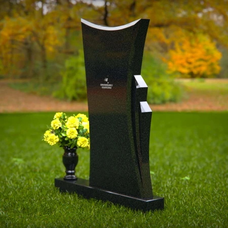 Contemporary granite memorial headstones with unique curved design.