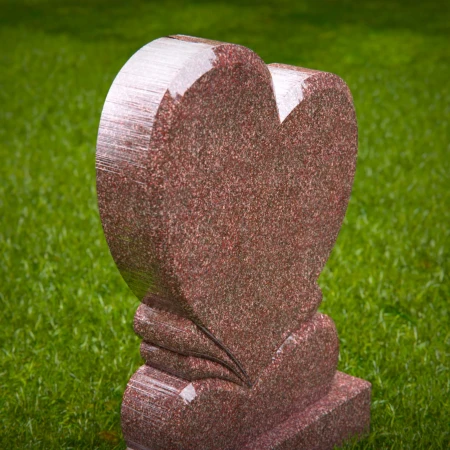 dual heart headstone etched with timeless emotional depth for memorials