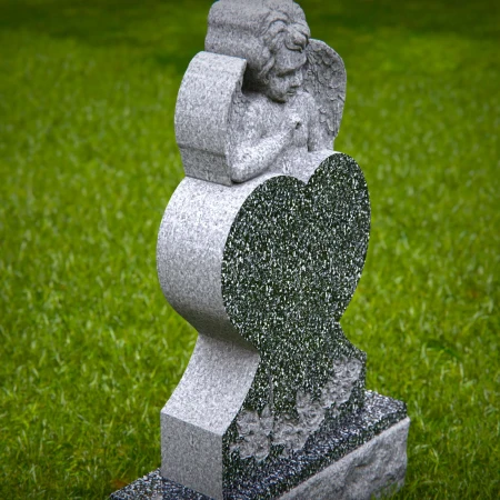 Compassionate memorials sculpted with angel and soft flower relief