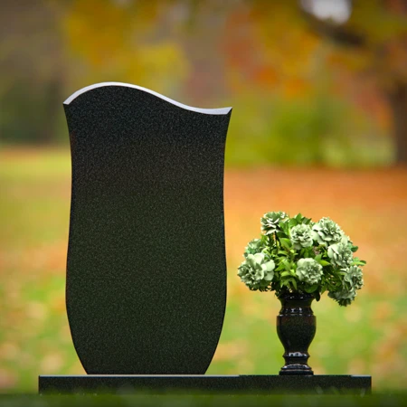 Modern wave design headstones shaped for graceful memorial tribute.