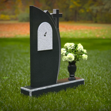 Unique headstones featuring a cross and elegant plaque design.