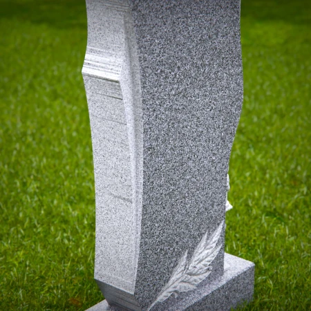 Carved forms reflect dignity and meaning in sculpted tombstones