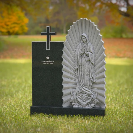 Religious headstones featuring Virgin Mary and cross for sacred memorials.