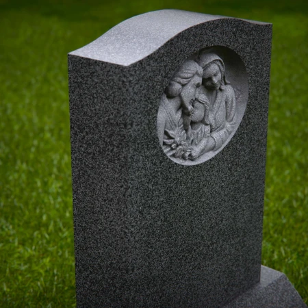1917 - Upright Monument with Family Relief Carving in Peaceful Setting