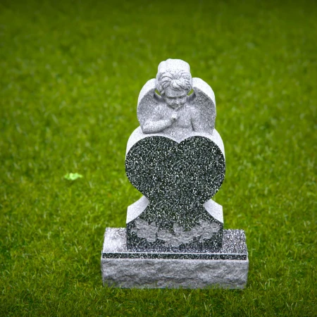 Compassionate memorials sculpted with angel and soft flower relief