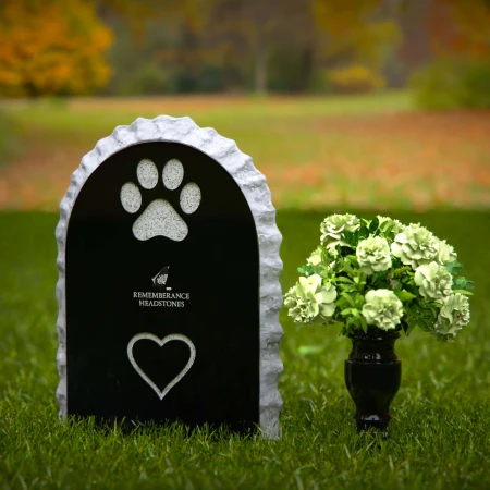 Pet memorial headstones with heart design honoring eternal love.