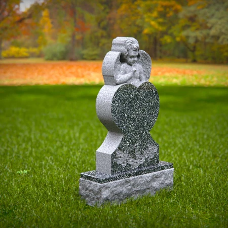 Compassionate memorials sculpted with angel and soft flower relief