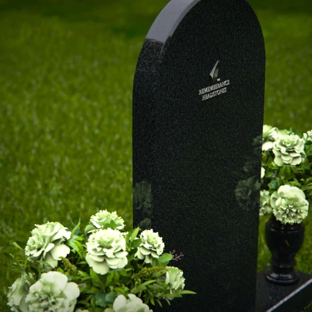 Elegant headstones with arched design symbolizing timeless memory.