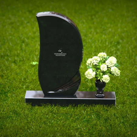 Modern curved headstones with single flower vase for memorials.